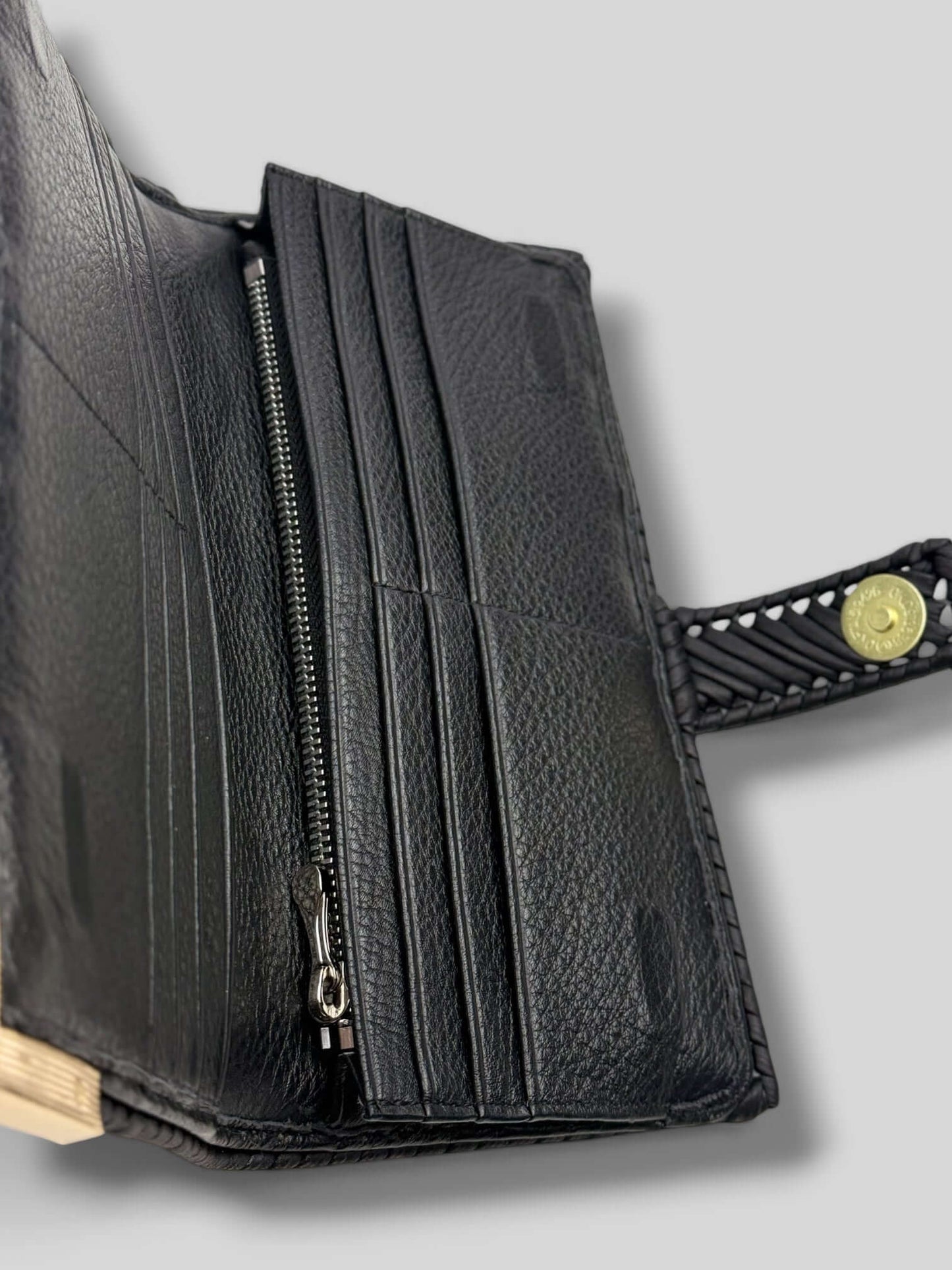 Polly Black Luxury Elegant Designer Wallet is a luxury elegant designer wallet for women created by CATTLEYA.Y.
A wallet with several compartments and a zipper compartment.