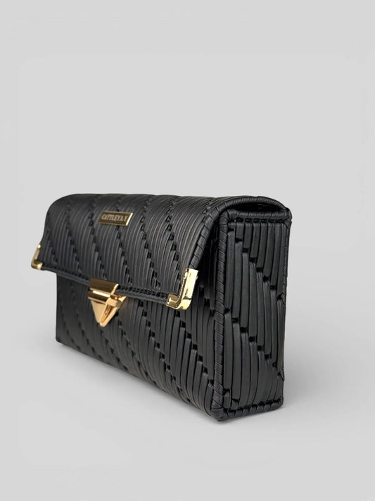 Tiffany is a black luxury handmade designer bag with gold metal details by CATTLEYA.Y