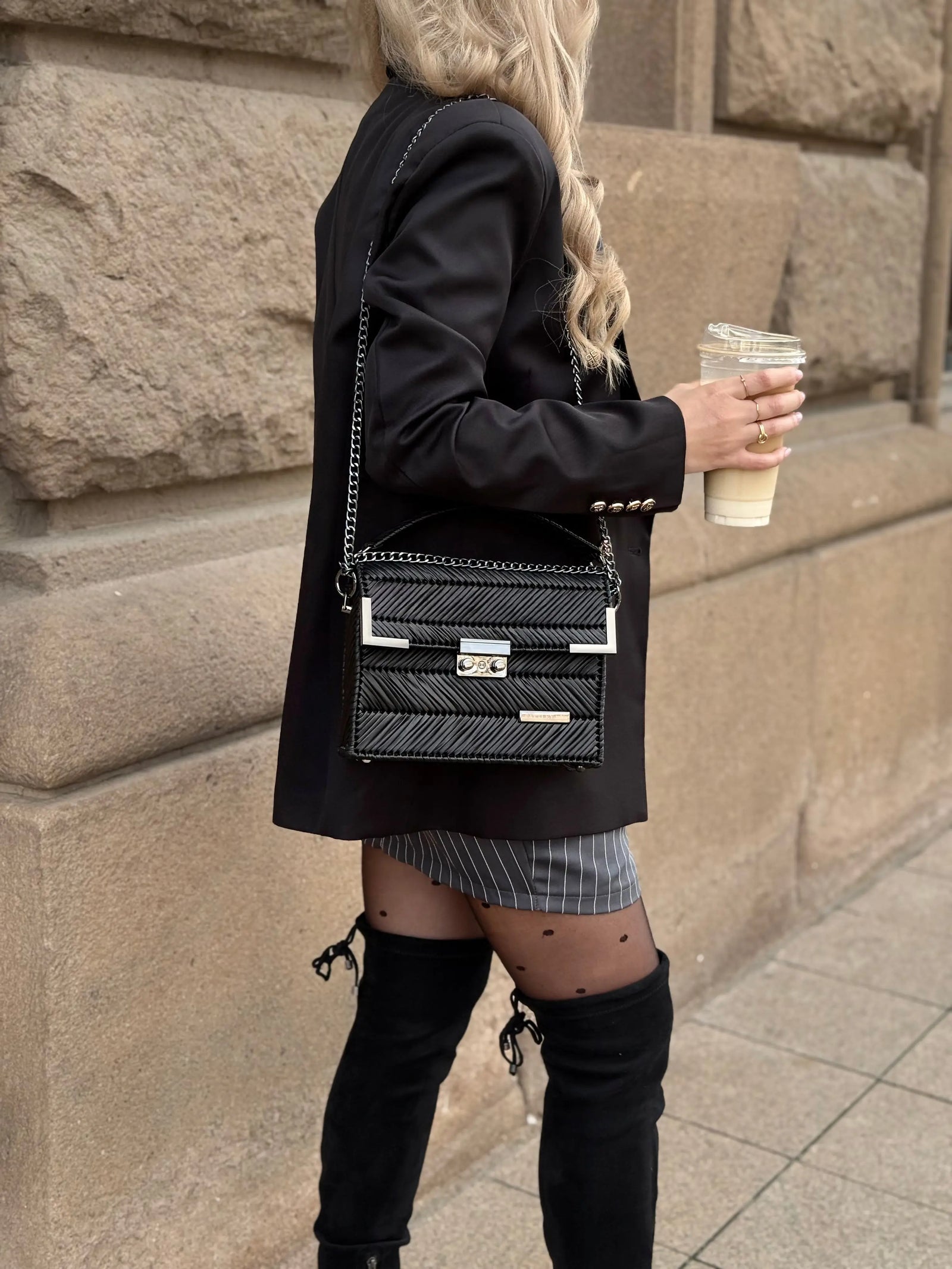 Amara Black is a black chevron luxury handmade designer bag by CATTLEYA.Y styled in elegant street look