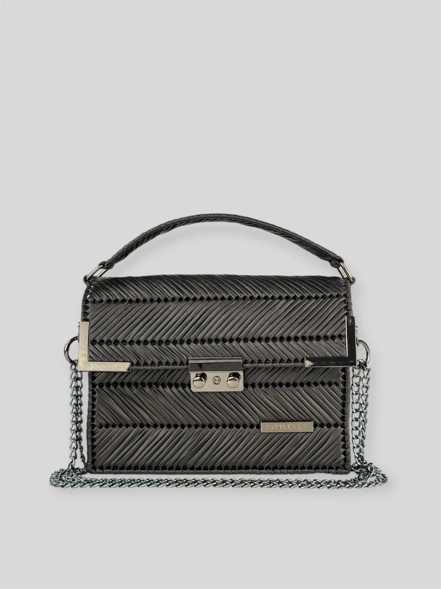 Amara Dark Brown is a luxury handmade designer bag by CATTLEYA.Y, distinguished by its rich chocolate tone and signature chevron texture. Timeless, structured and refined, it embodies quiet confidence and modern elegance.