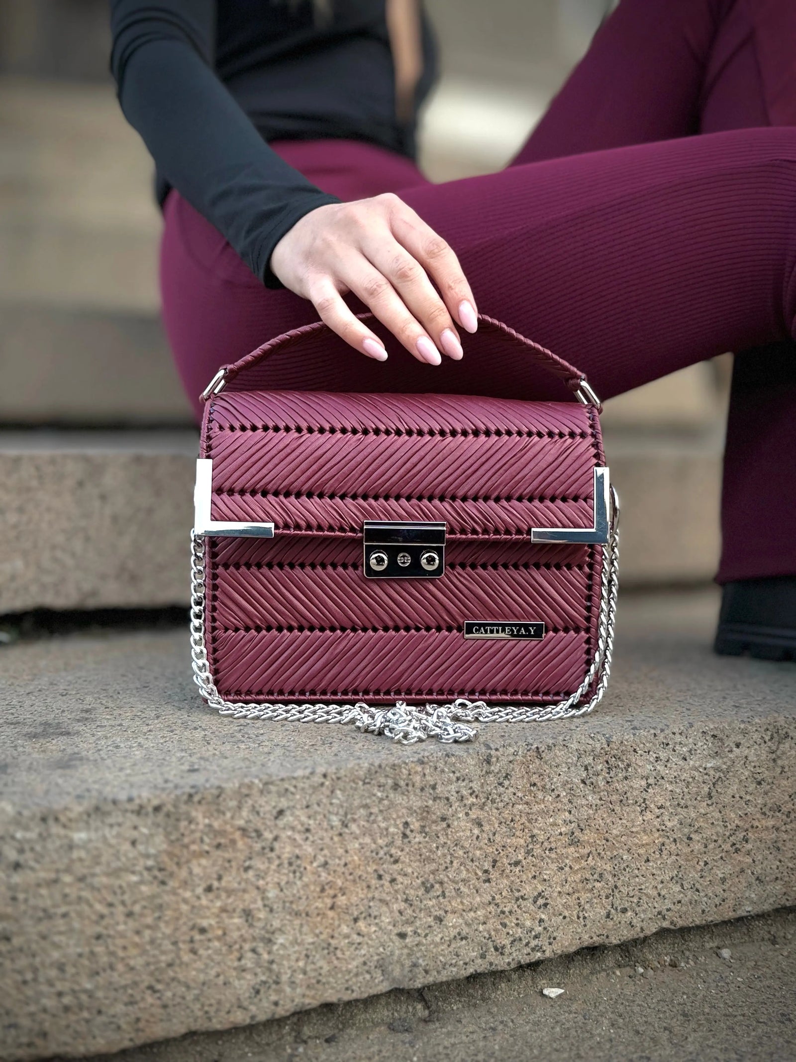 Amara Burgundy is a black chevron luxury handmade designer bag by CATTLEYA.Y styled in elegant street look