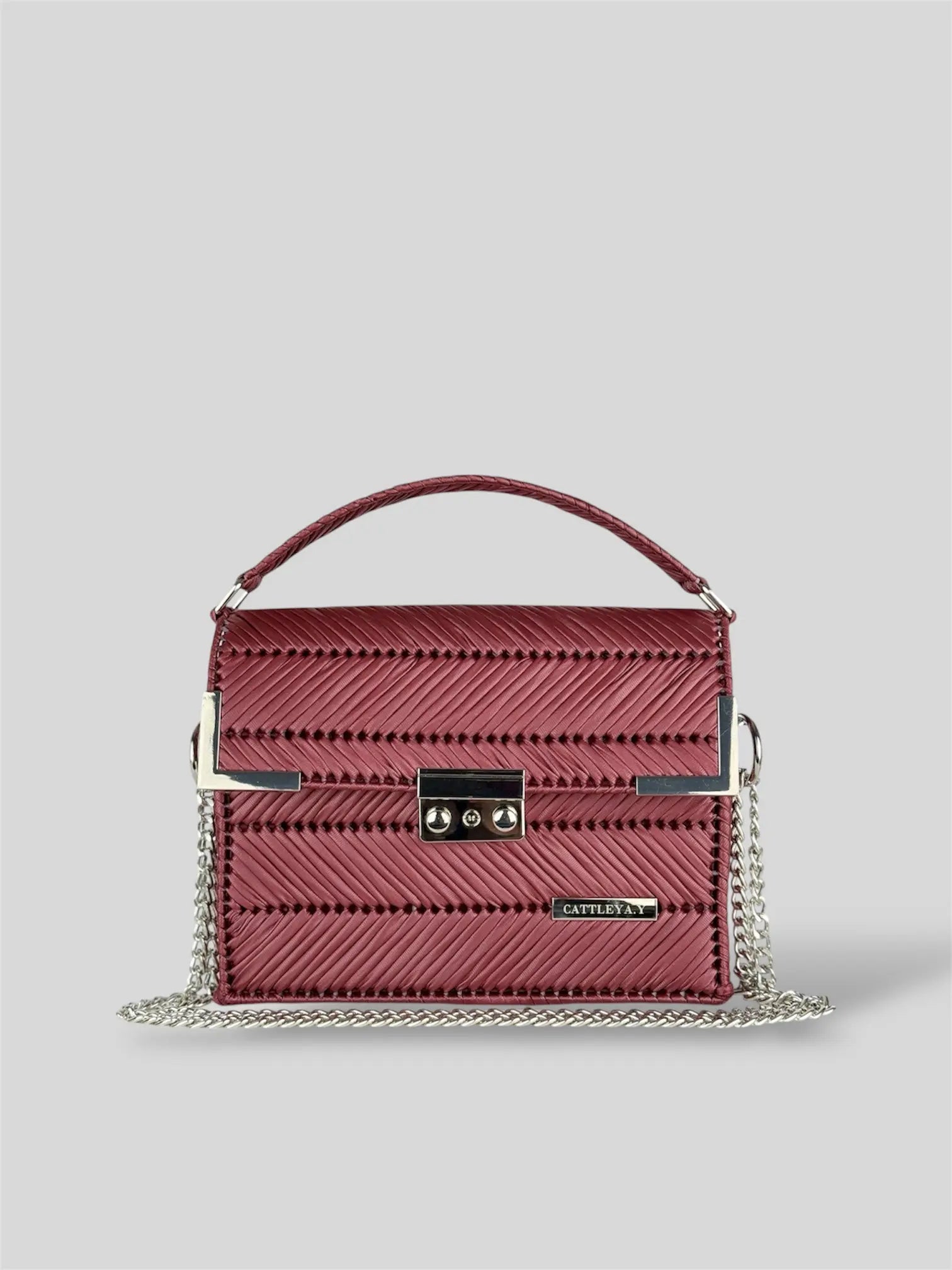 Amara Burgundy is a luxury handmade designer bag by CATTLEYA.Y, distinguished by its rich wine-red tone and refined chevron texture. Elegant yet bold, it captures timeless femininity with a contemporary edge.
