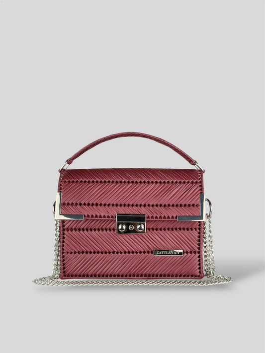 Amara Burgundy is a luxury handmade designer bag by CATTLEYA.Y, distinguished by its rich wine-red tone and refined chevron texture. Elegant yet bold, it captures timeless femininity with a contemporary edge.