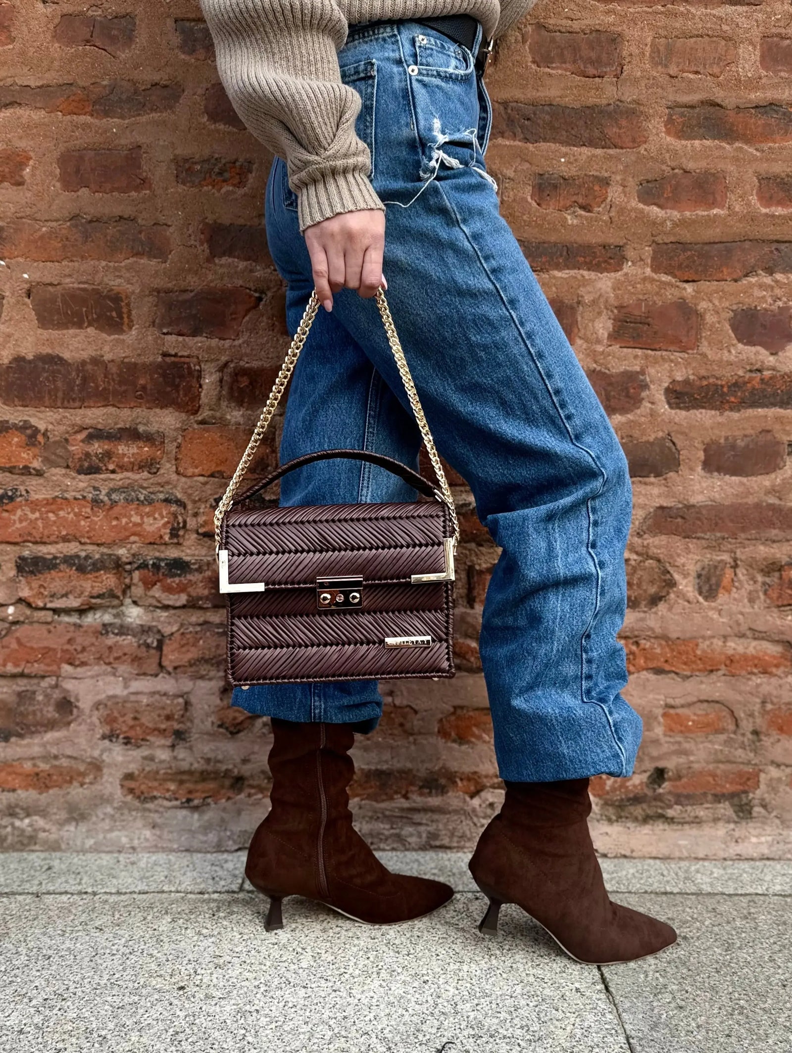 Amara Dark Brown is a black chevron luxury handmade designer bag by CATTLEYA.Y styled in elegant street look