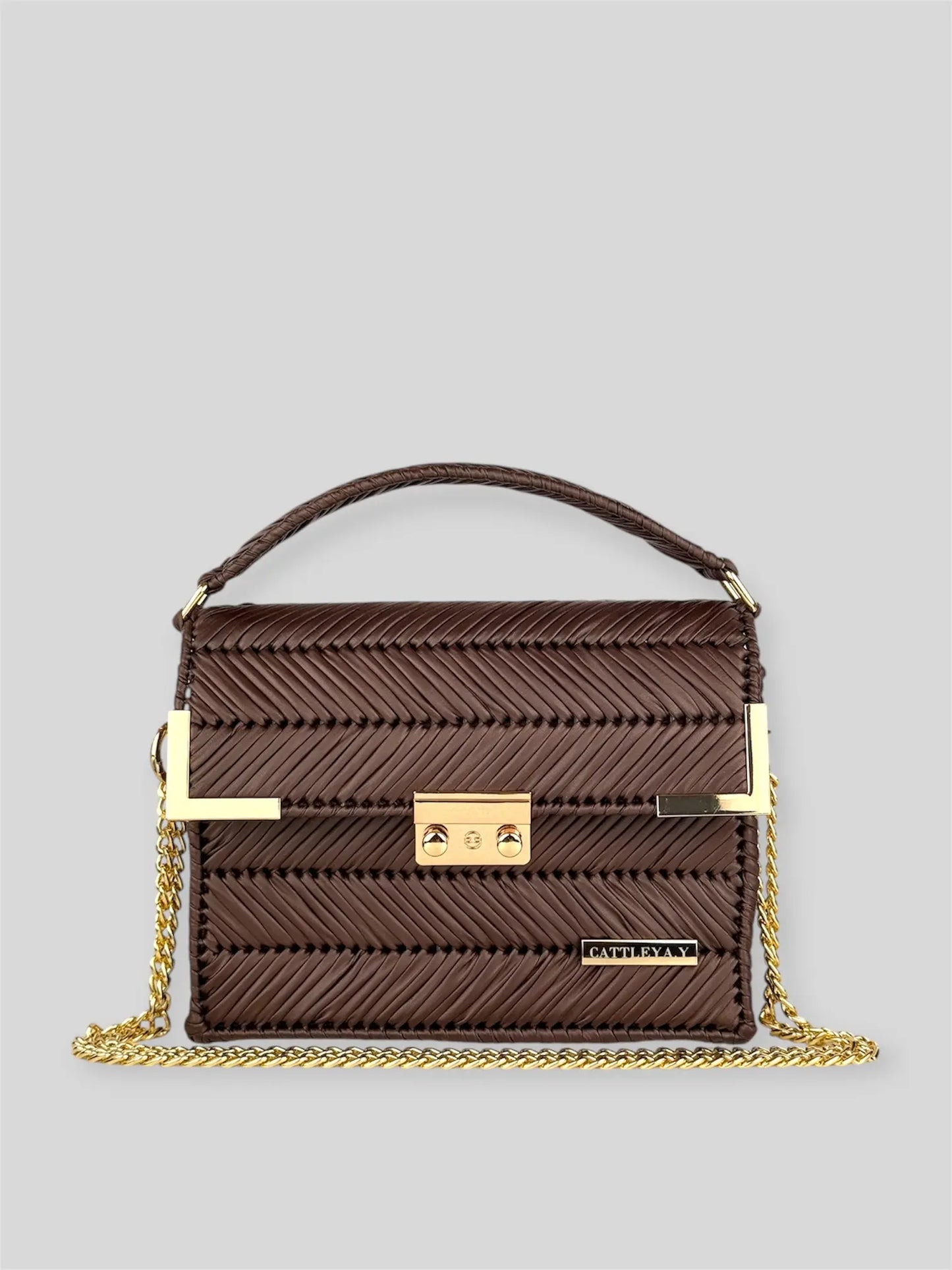 Amara Dark Brown is a luxury handmade designer bag by CATTLEYA.Y, distinguished by its rich chocolate tone and signature chevron texture. Timeless, structured and refined, it embodies quiet confidence and modern elegance.