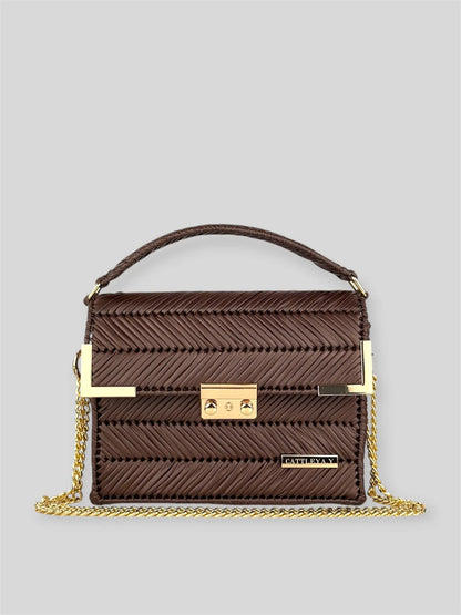 Amara Dark Brown is a luxury handmade designer bag by CATTLEYA.Y, distinguished by its rich chocolate tone and signature chevron texture. Timeless, structured and refined, it embodies quiet confidence and modern elegance.