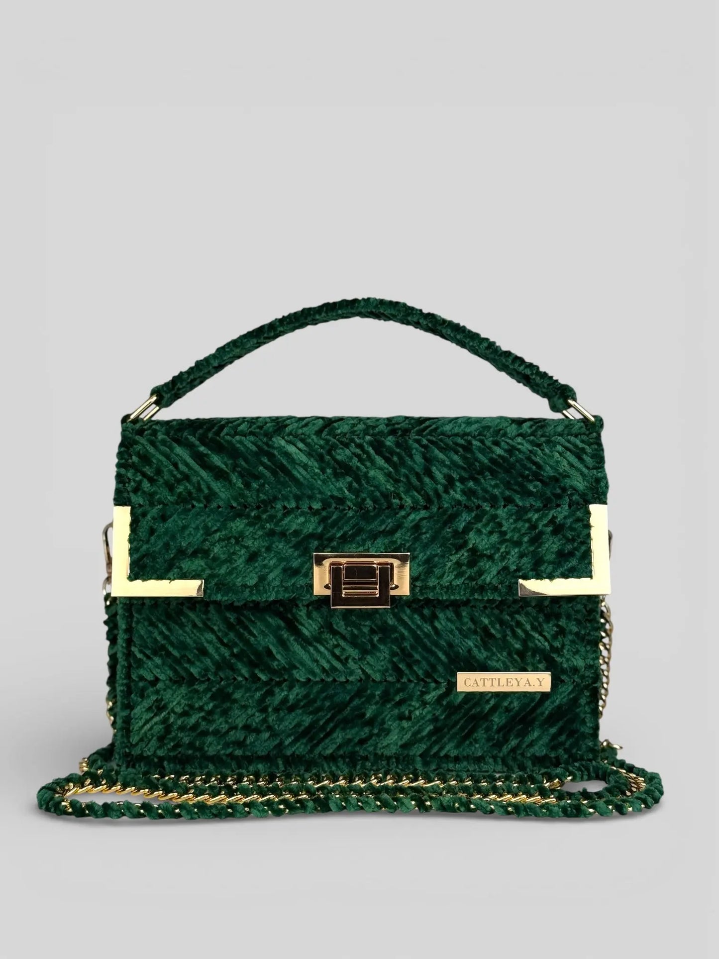 Amara Winter Emerald is a luxury handmade designer bag by CATTLEYA.Y