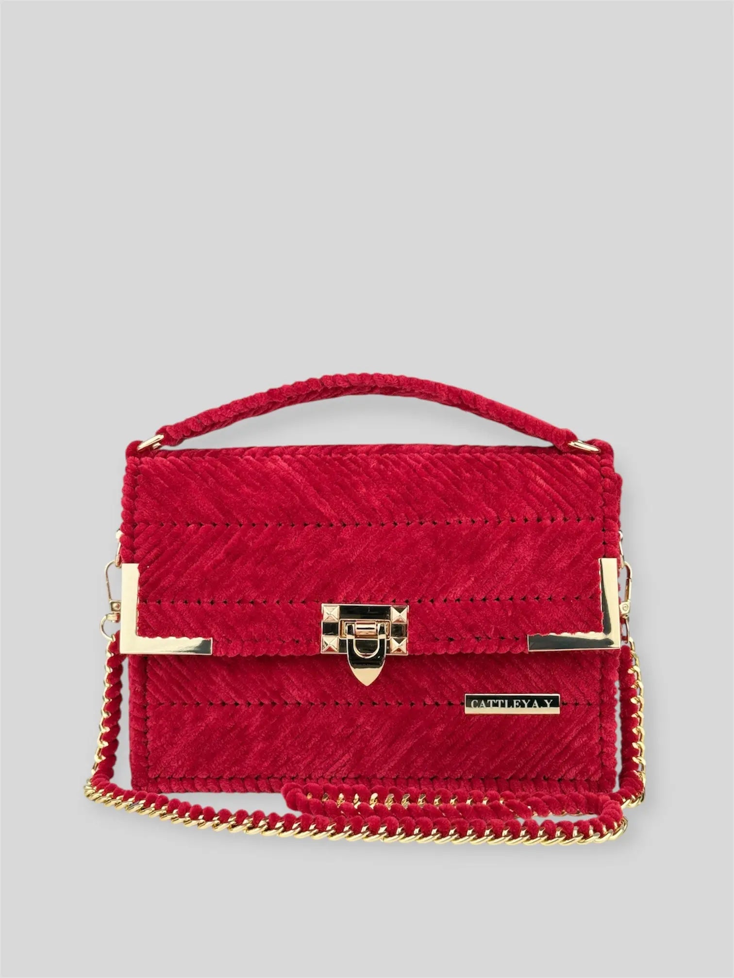 Amara Winter Blue is a luxury handmade designer bag by CATTLEYA.Y, defined by its deep blue tone and refined chevron texture. The structured silhouette creates a polished presence suitable for both elevated everyday wear and evening styling.
