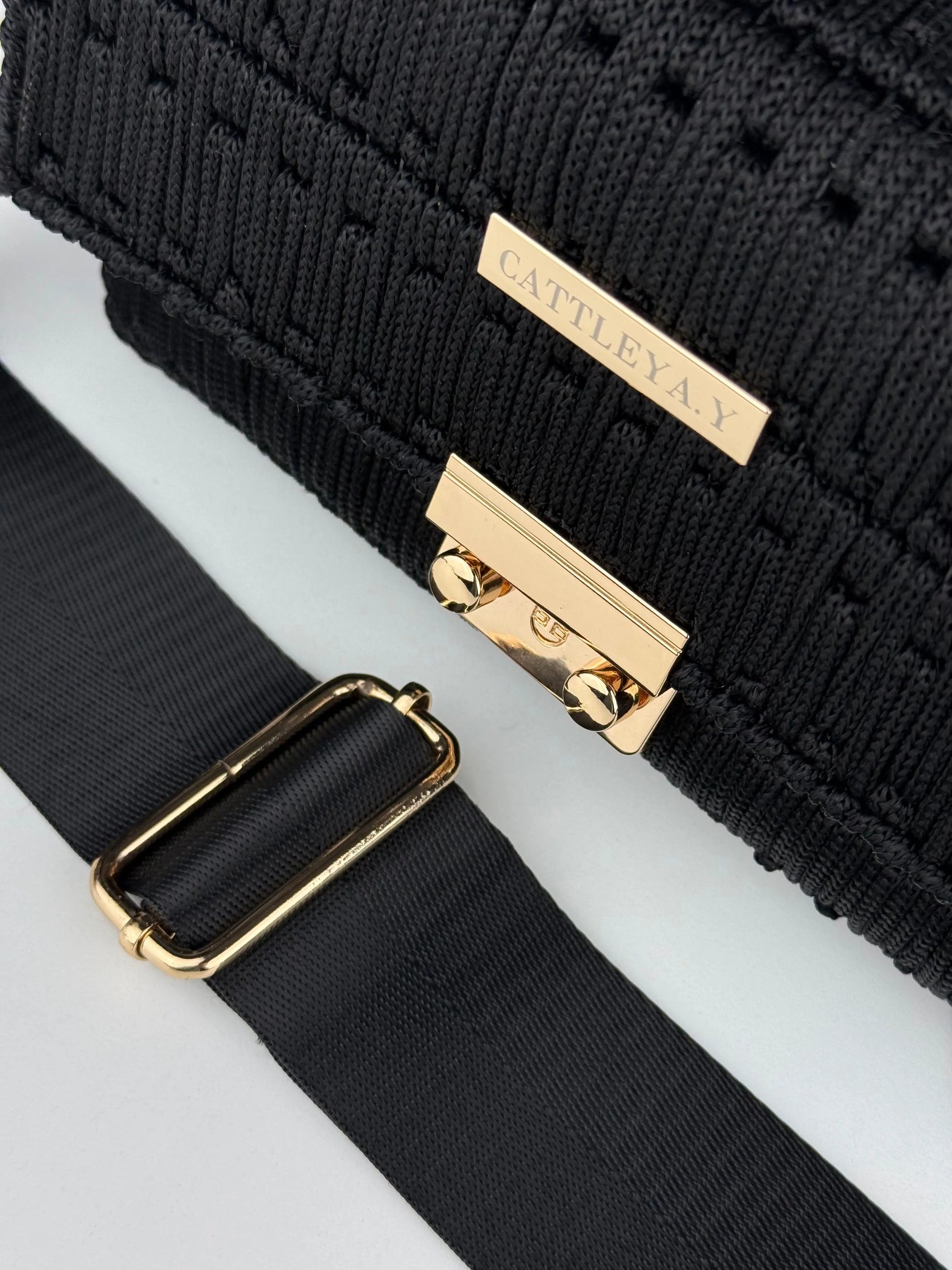 Aurora Black is a luxury handmade macrame designer bag with adjustable shoulder strap by CATTLEYA.Y
