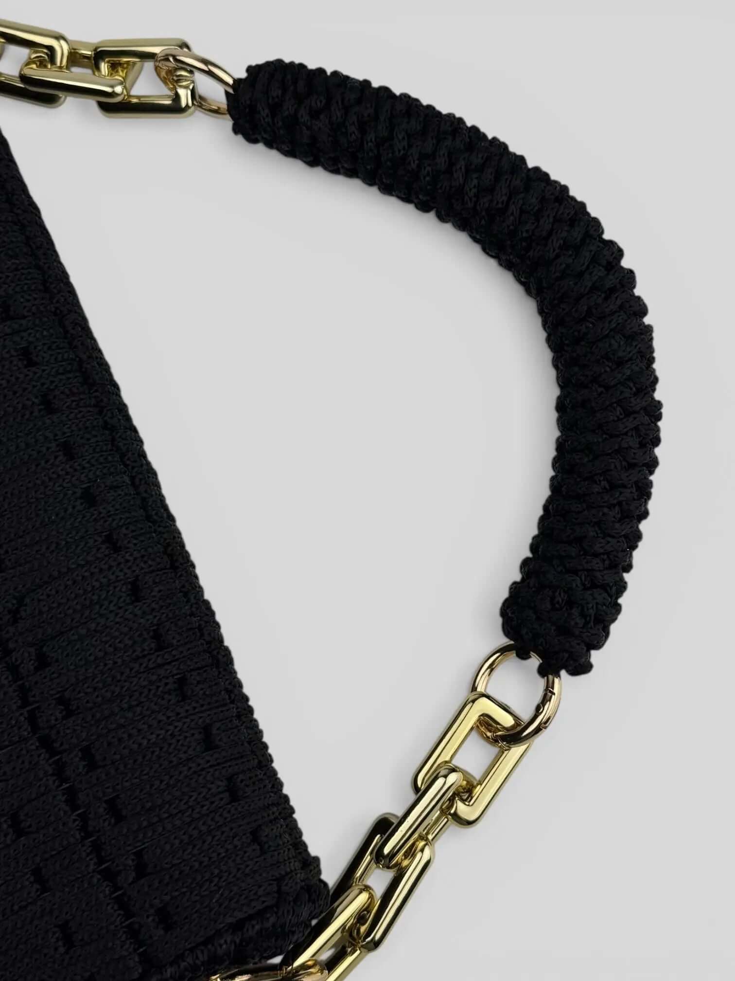 Aurora Black is a luxury handmade macrame designer bag with a top handle by CATTLEYA.Y