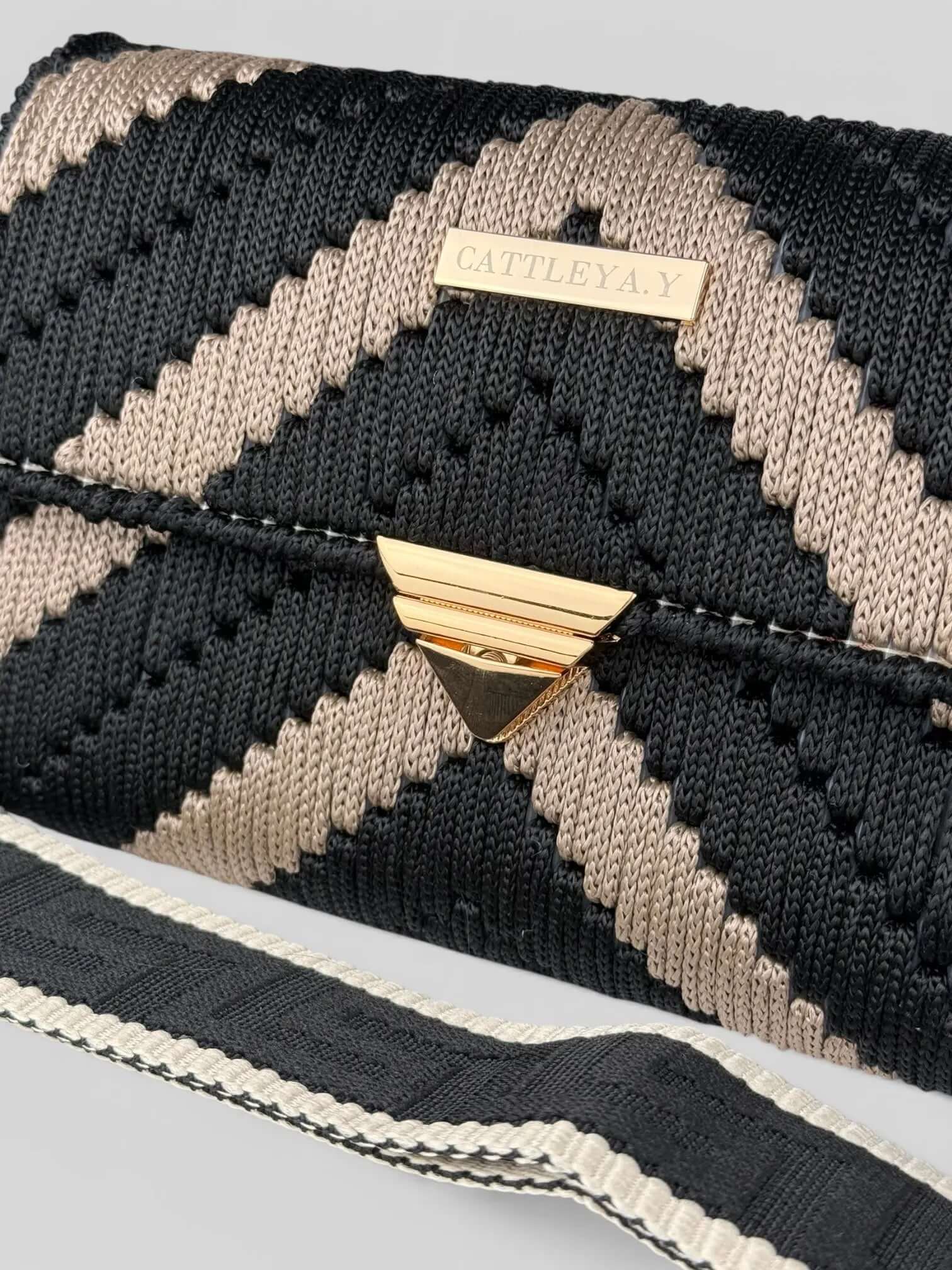 Aurora is a luxury handmade macrame designer bag with gold clasp and woven macramé texture by CATTLEYA.Y
