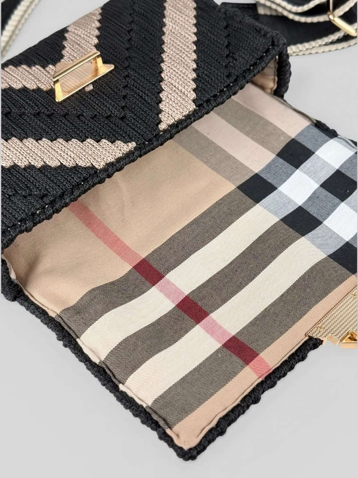 Aurora is a luxury handmade macrame designer bag. The interior lining with classic check pattern designer handbag