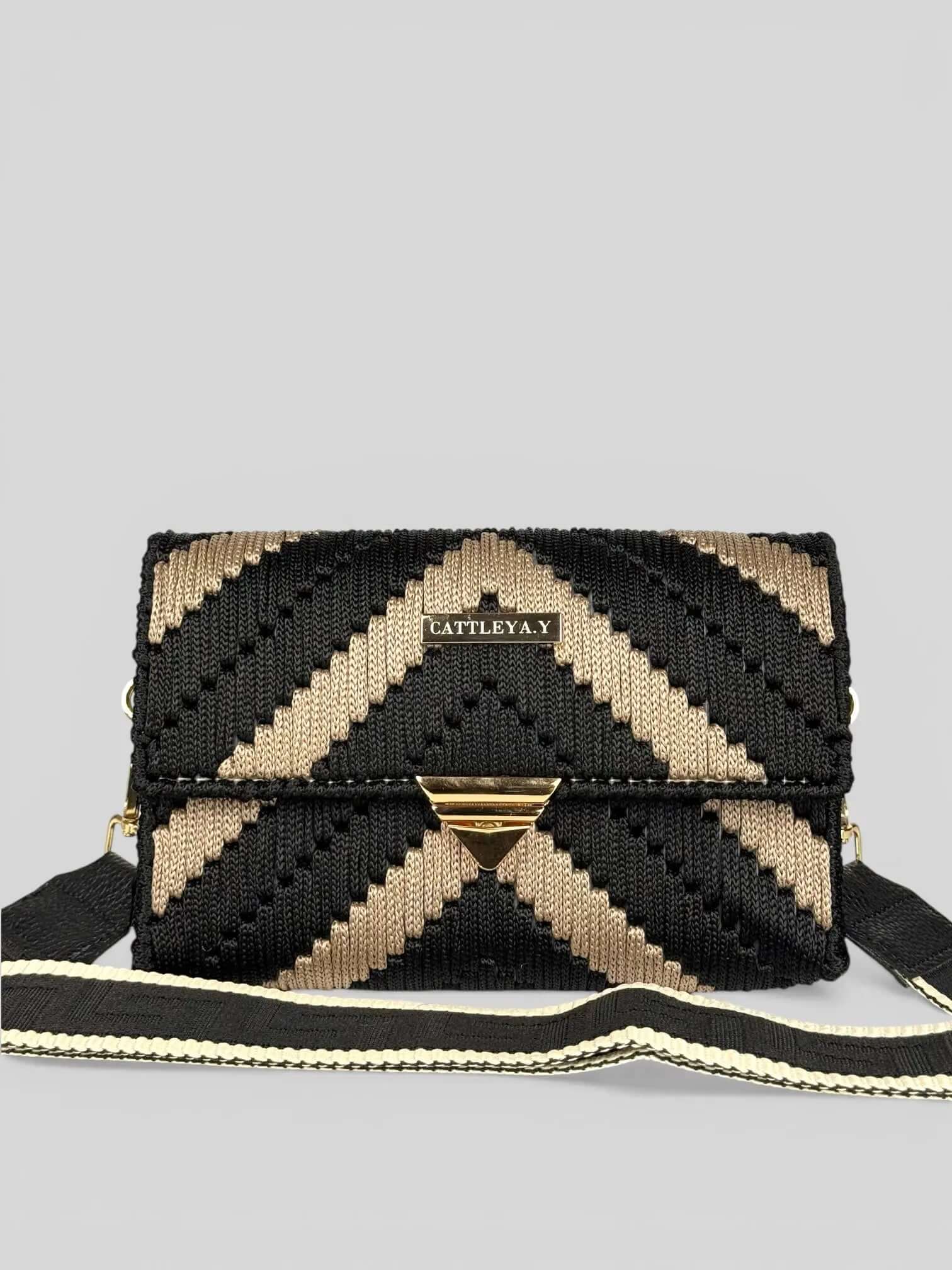 Aurora is a luxury handmade macrame designer bag. It is with black and sand chevron pattern by CATTLEYA.Y