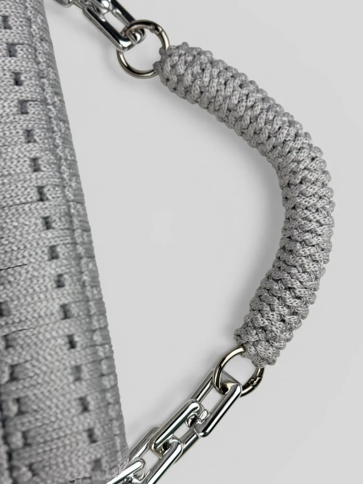 Aurora Silver is a luxury handmade macrame designer bag with a top handle by CATTLEYA.Y