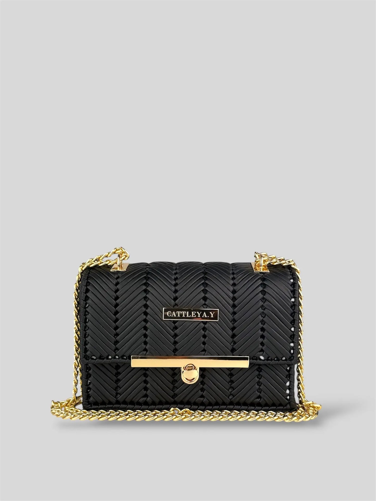 Brilliant Black is a luxury handmade mini designer bag by CATTLEYA.Y, defined by its deep black tone and refined chevron texture. Elegant yet bold, the design expresses modern sophistication through clean geometric lines and carefully balanced proportions.