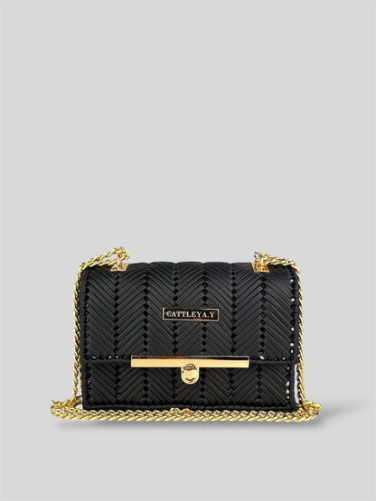 Brilliant Black is a luxury handmade mini designer bag by CATTLEYA.Y, defined by its deep black tone and refined chevron texture. Elegant yet bold, the design expresses modern sophistication through clean geometric lines and carefully balanced proportions.