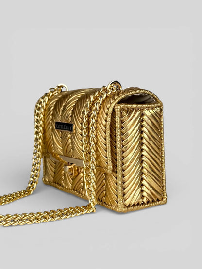 Brilliant Gold is a luxury handmade mini designer bag by CATTLEYA.Y
Gold handmade mini handbag with gold chain strap – CATTLEYA.Y