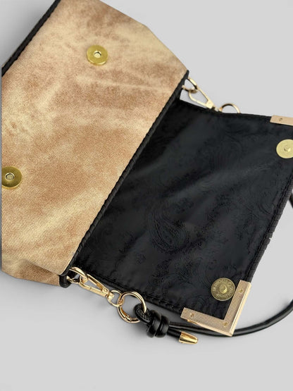 Interior of Denim Beige handbag with black lining and magnetic closure.
Denis Beige is luxury handmade designer bag by CATTLEYA.Y