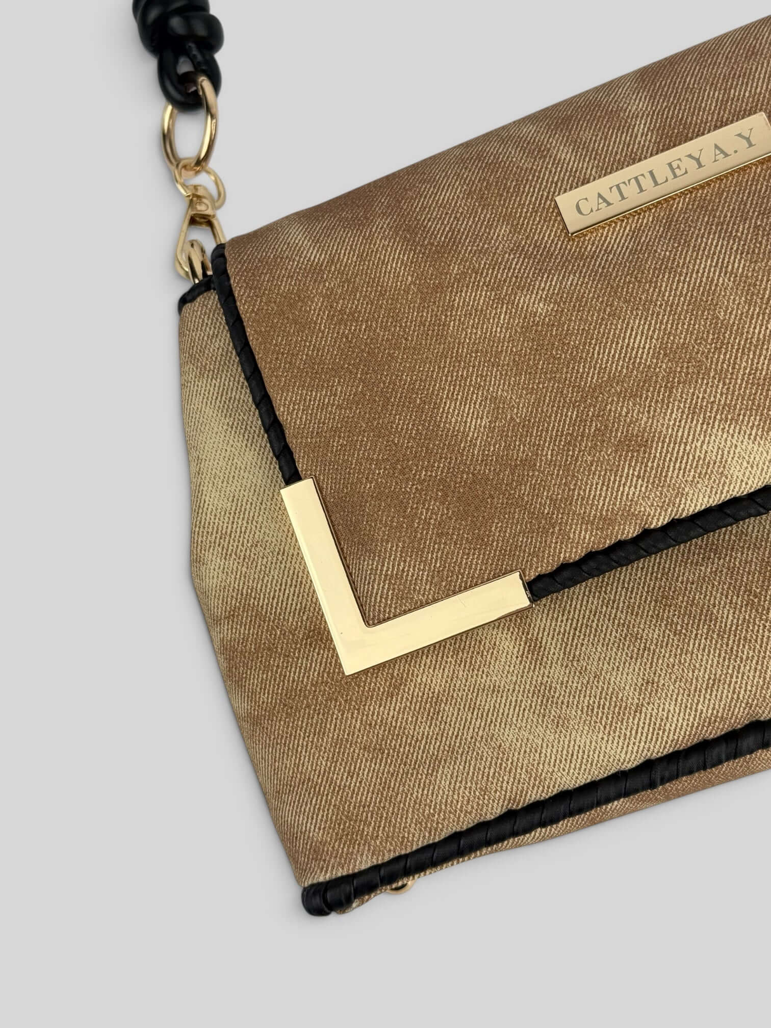 Denim Beige denim bag texture detail in soft pink. Denim Beige is a Luxury Handmade Designer Bag by CATTLEYA.Y