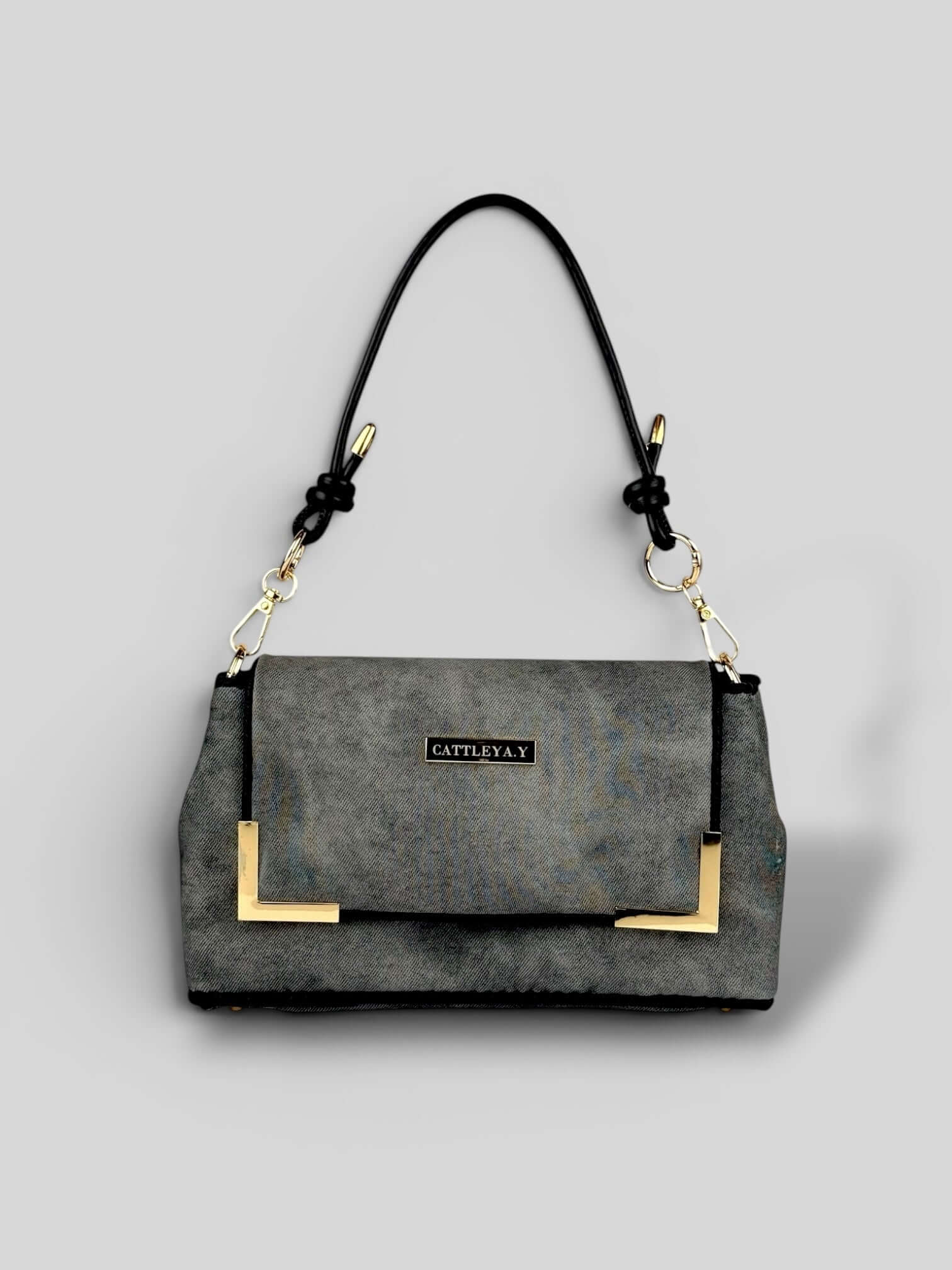 Denim Graphite luxury bag front view.
Denim Graphite is a Luxury Handmade Designer Bag by CATTLEYA.Y