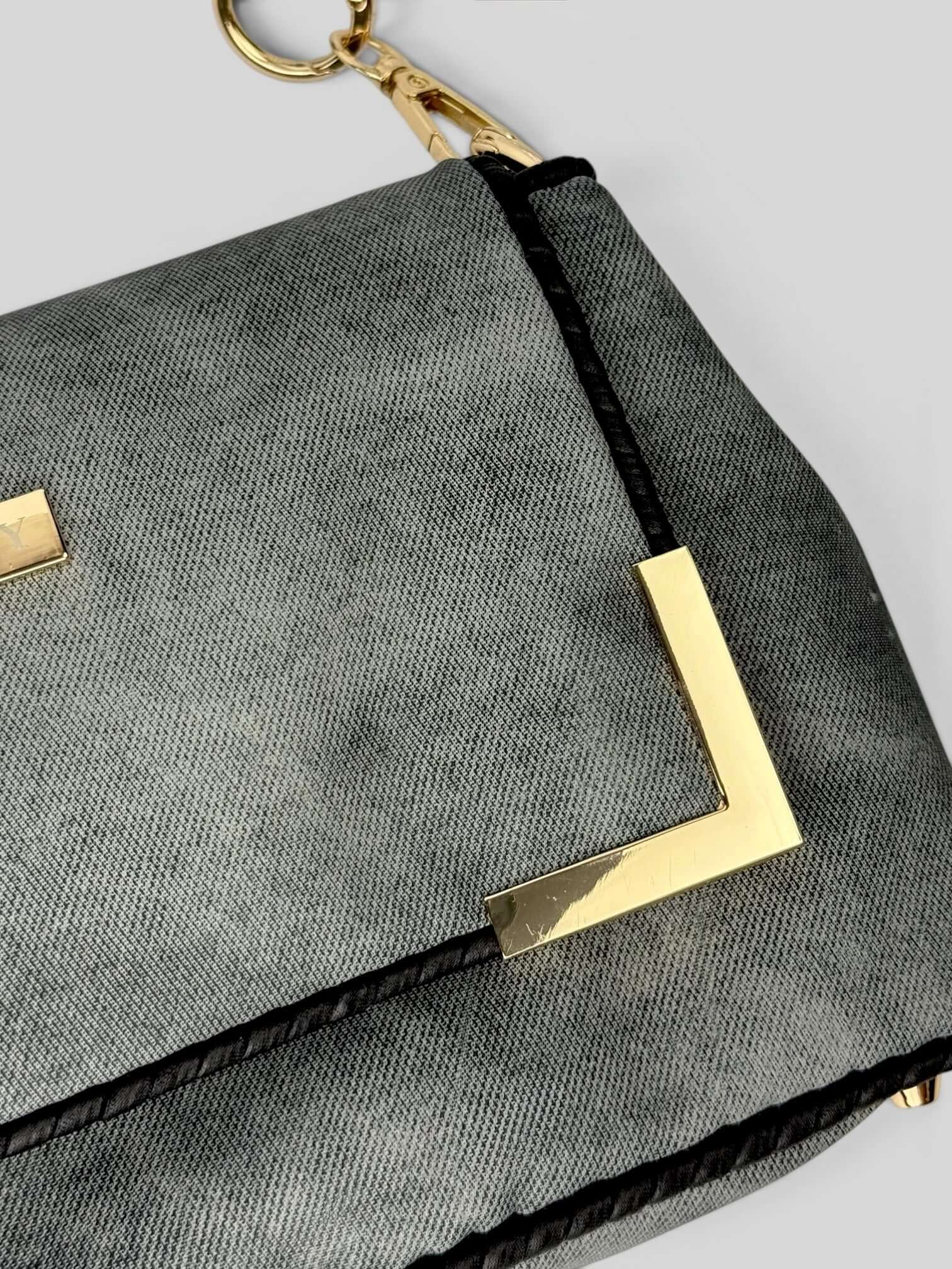 Denim Graphite denim bag texture detail in soft pink. Denim Graphite is a Luxury Handmade Designer Bag by CATTLEYA.Y
