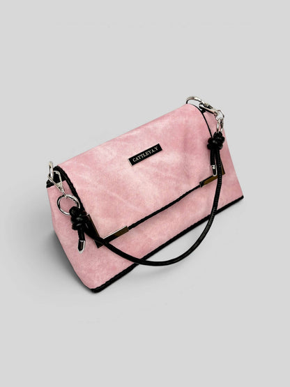 Denim Pink bag side view with strap.
Denim Pink is a Luxury Handmade Designer Bag by CATTLEYA.Y