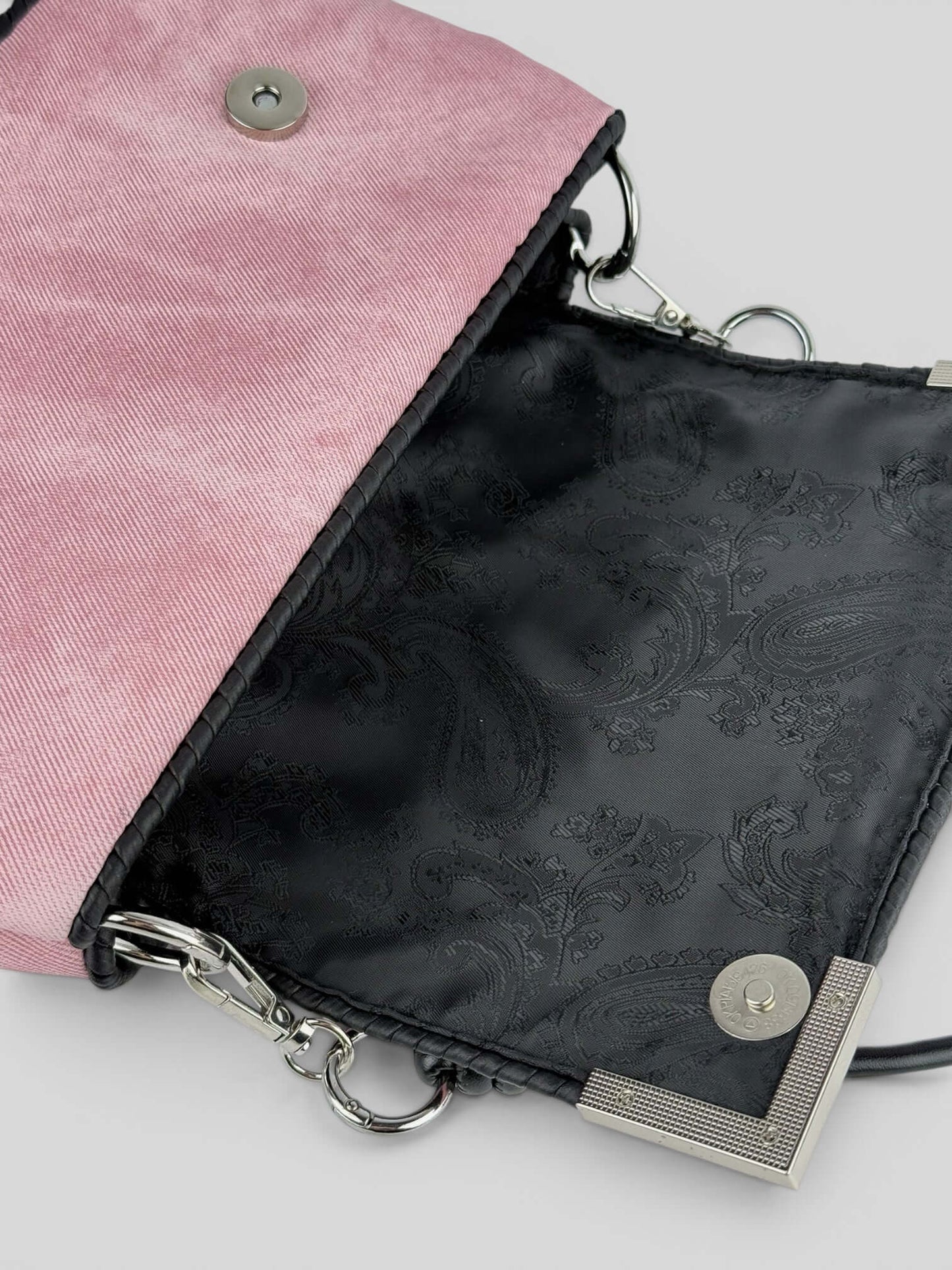 Denim Pink denim bag texture detail in soft pink. Denim Pink is a Luxury Handmade Designer Bag by CATTLEYA.Y