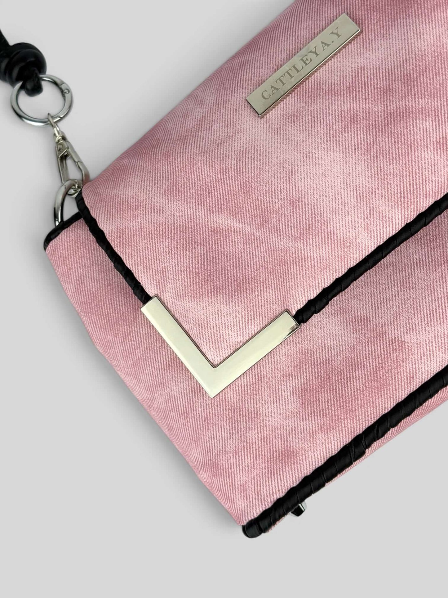 Denim Pink denim bag texture detail in soft pink. Denim Pink is a Luxury Handmade Designer Bag by CATTLEYA.Y