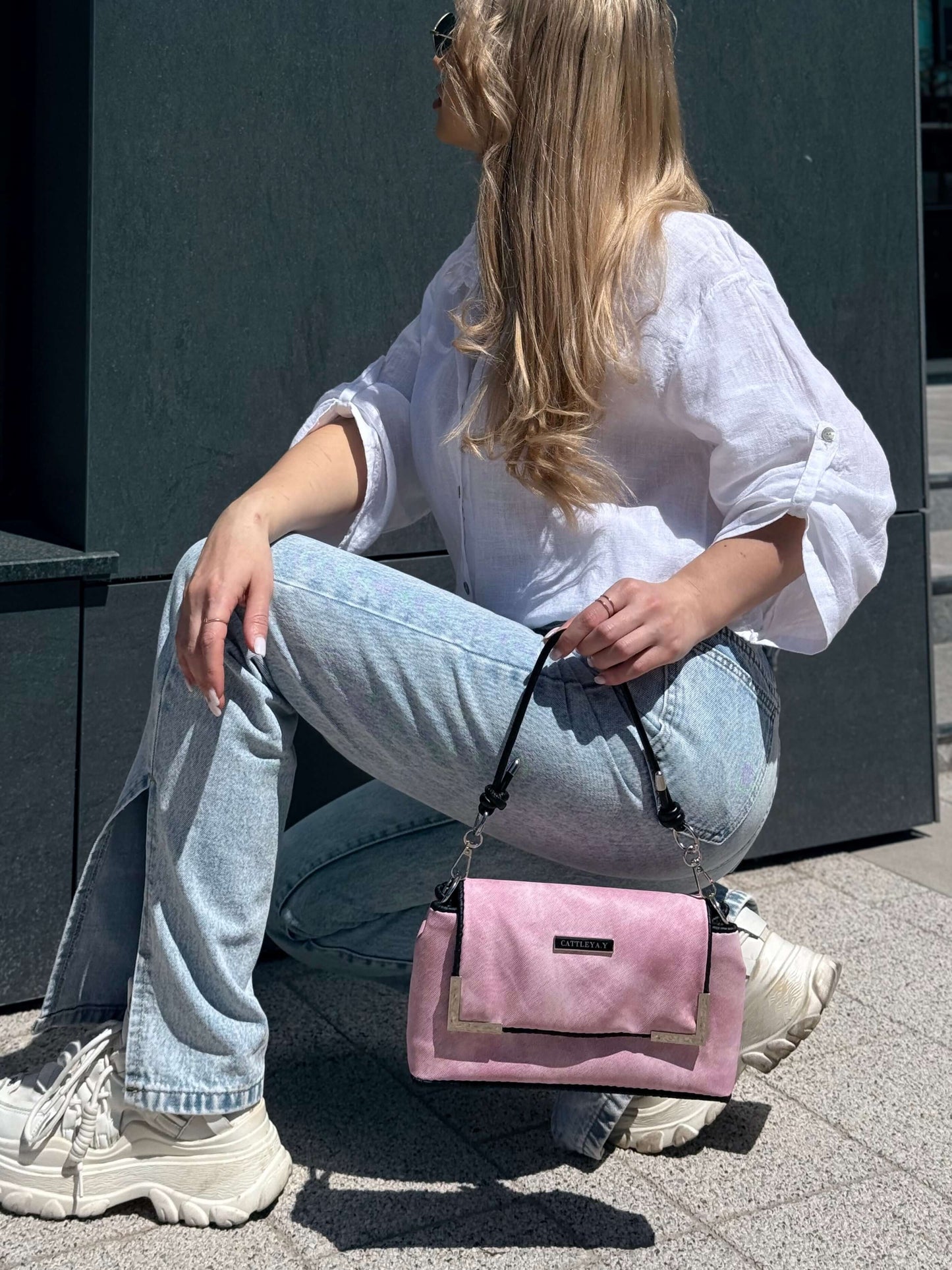 Denim Pink luxury handmade designer bag by CATTLEYA.Y lifestyle look with model