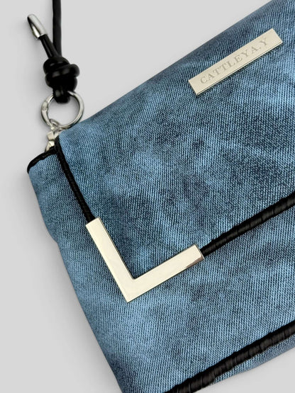 Denim Sky denim bag texture detail in blue. Denim Sky is a Luxury Handmade Designer Bag by CATTLEYA.Y
