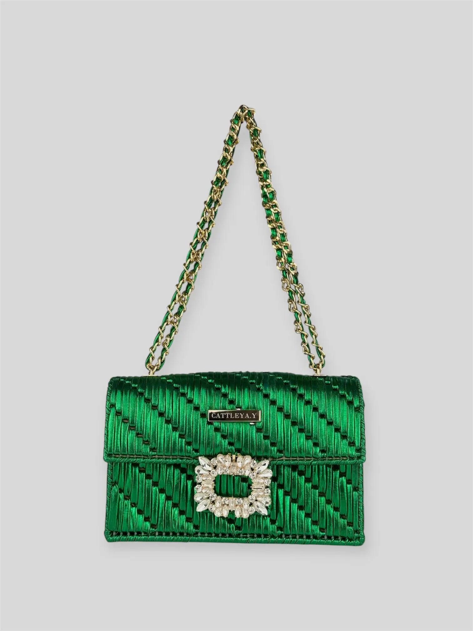 Destiny Emerald is a luxury handmade designer bag by CATTLEYA.Y, inspired by the richness and depth of emerald gemstones. The luminous satin-finish yarn creates a vibrant surface that radiates elegance with every movement.