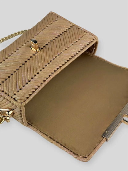 Mermaid Coral is a luxury handmade designer bag by CATTLEYA.Y, defined by its luminous pearlescent yarn and sculpted geometric texture. Inspired by warm ocean tones, it radiates soft elegance and refined femininity.
Golden satin lining inside Mermaid Coral designer bag