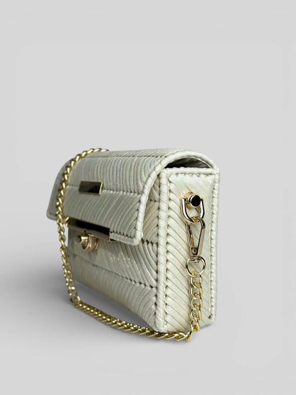 Mermaid Pearl is a pearl chevron luxury handmade designer bag by CATTLEYA.Y. Side view with gold-tone chain.