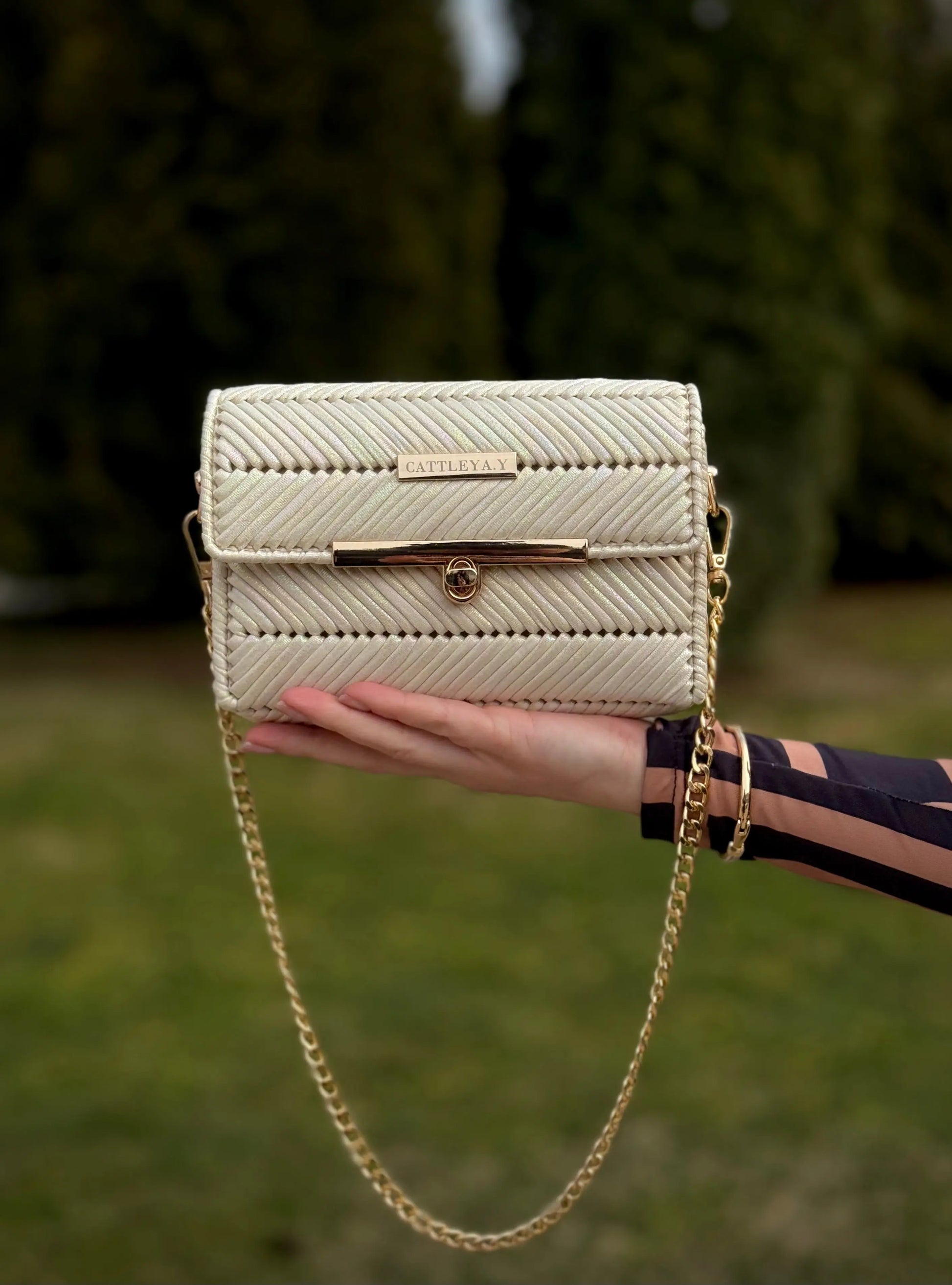 Mermaid Pearl is a pearl chevron luxury handmade designer bag by CATTLEYA.Y front view with gold chain strap