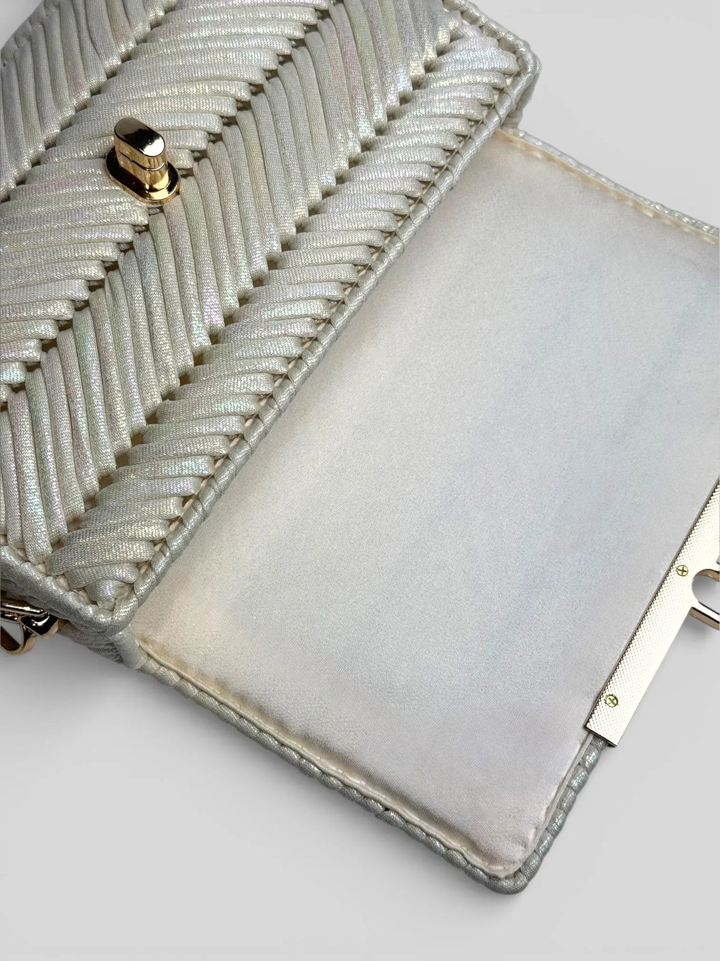 Mermaid Pearl pearl luxury handmade designer bag by CATTLEYA.Y. Satin interior and gold clasp detail by CATTLEYA.Y