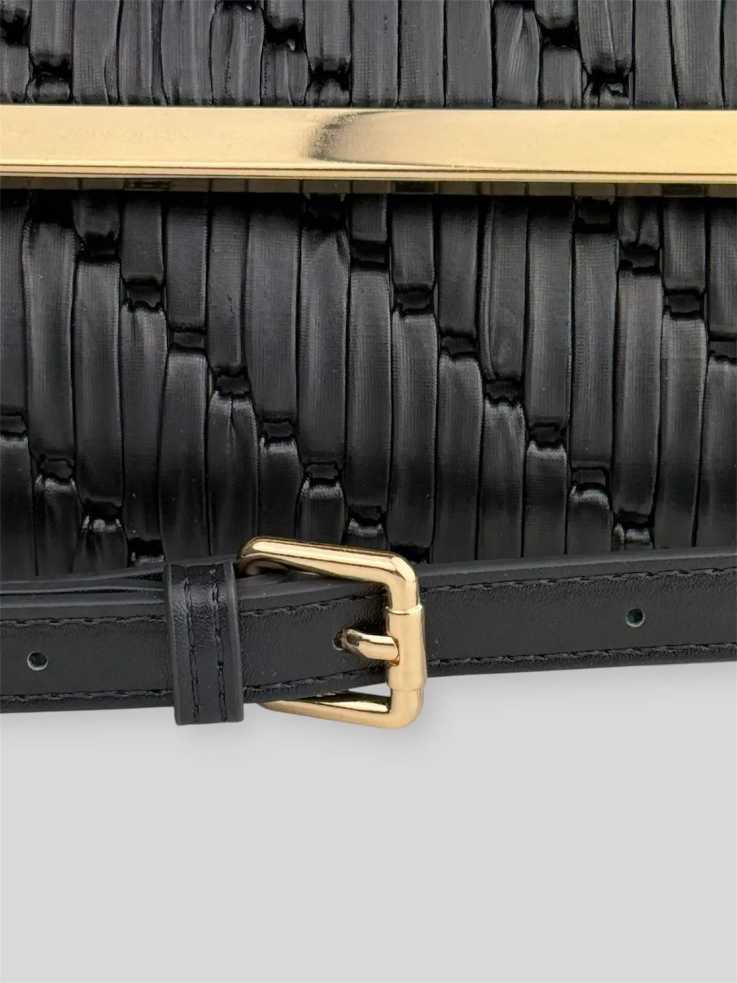Noir is a luxury handmade designer bag by CATTLEYA.Y, defined by its deep black tone and architectural silhouette. Designed for women who embrace modern minimalism, it delivers powerful elegance with refined restraint.
Adjustable strap detail Noir black designer bag