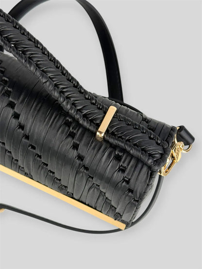 Noir is a luxury handmade designer bag by CATTLEYA.Y, defined by its deep black tone and architectural silhouette. Designed for women who embrace modern minimalism, it delivers powerful elegance with refined restraint.
Black textured eco-leather detail Noir handbag