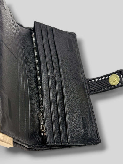 Polly Black Luxury Elegant Designer Wallet is a luxury elegant designer wallet for women created by CATTLEYA.Y.
A wallet with several compartments and a zipper compartment.