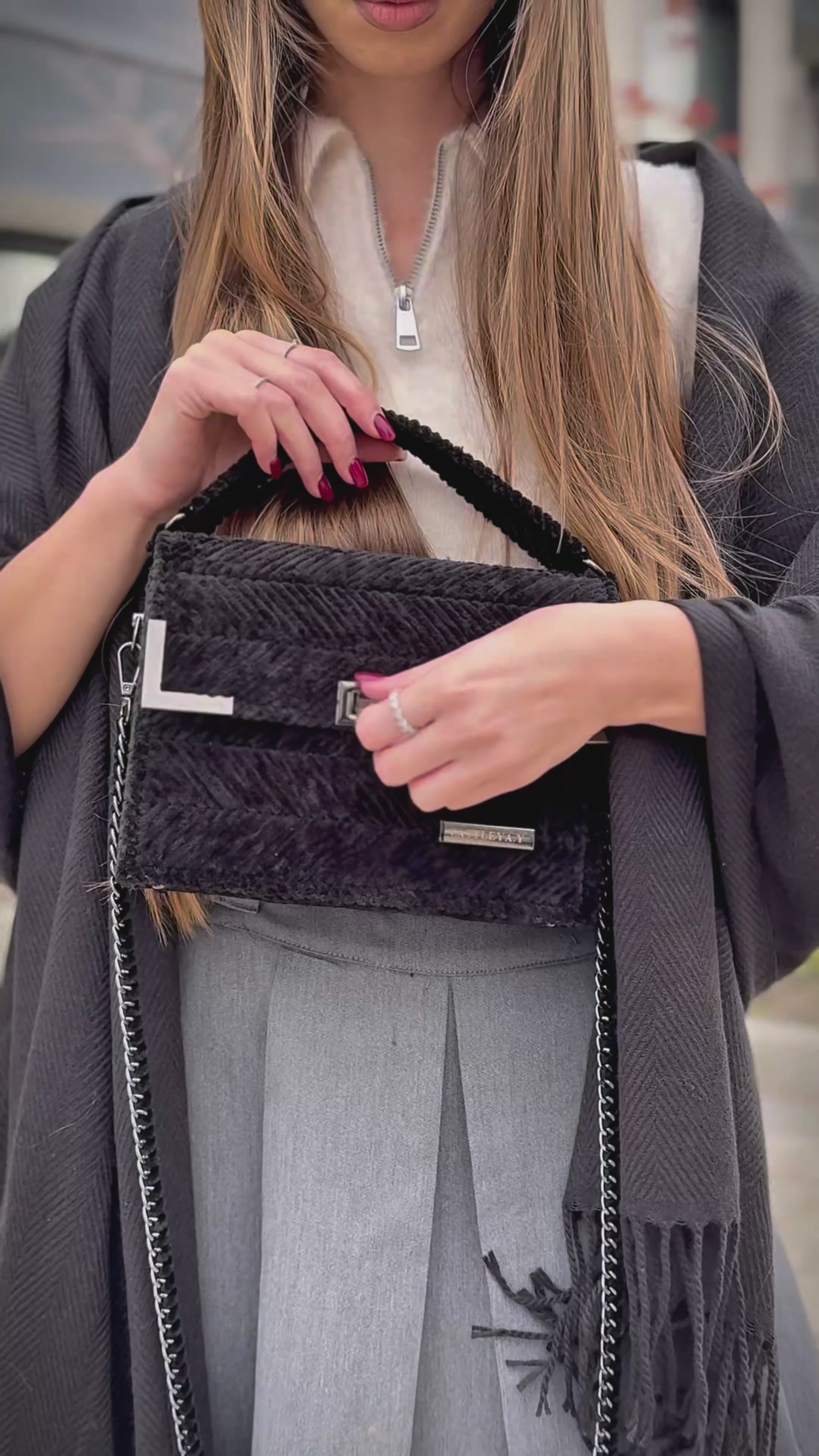 Load video: Amara Winter Black luxury black structured designer bag CATTLEYA.Y