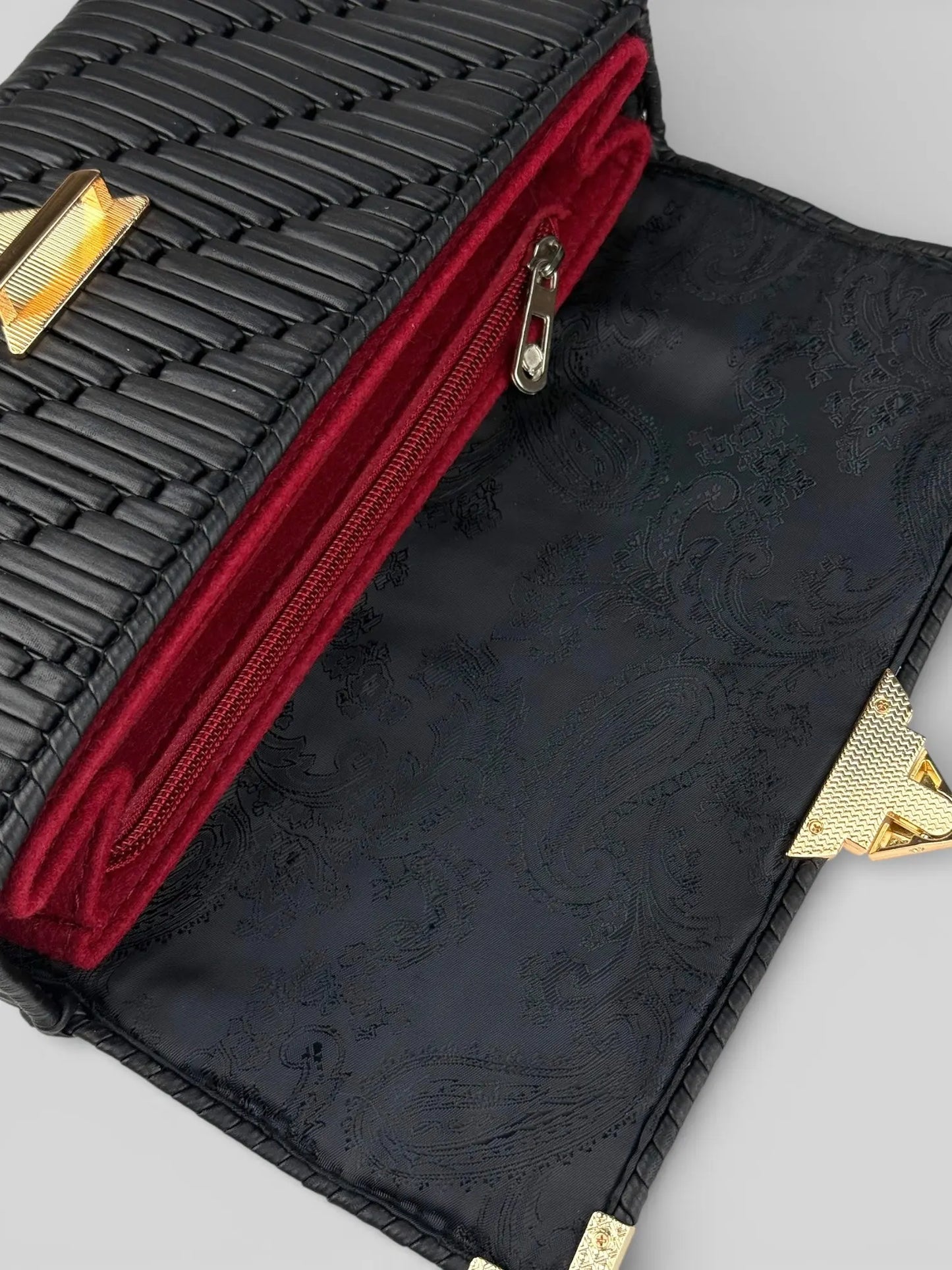 Tiffany is a black luxury handmade designer bag. Open interior view with structured organizer compartments by CATTLEYA.Y