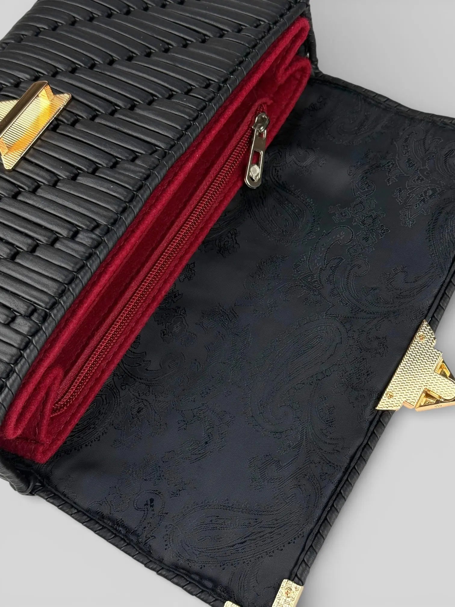 Tiffany is a black luxury handmade designer bag. Open interior view with structured organizer compartments by CATTLEYA.Y