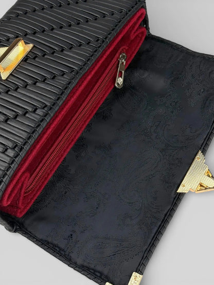 Tiffany is a black luxury handmade designer bag. Open interior view with structured organizer compartments by CATTLEYA.Y
