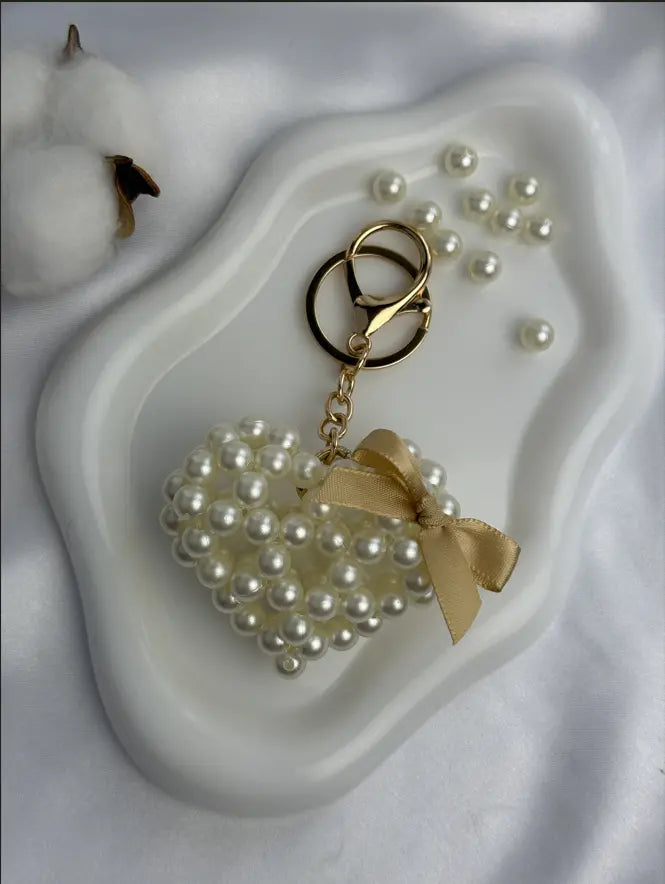 White Pearl Heart is a luxury bag charm by CATTLEYA.Y